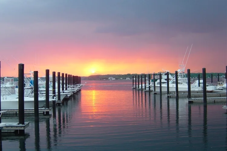 Belmar dock bathed in the warm glow of a sunset.